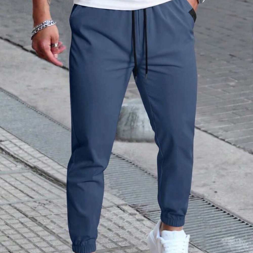 Manfinity Homme Men's Solid Color Drawstring Waist Pocketed Long Pants Slacks